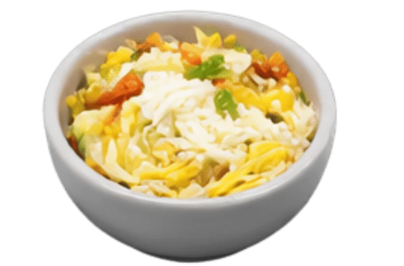 Bowl of mixed noodles with vegetables and toppings
