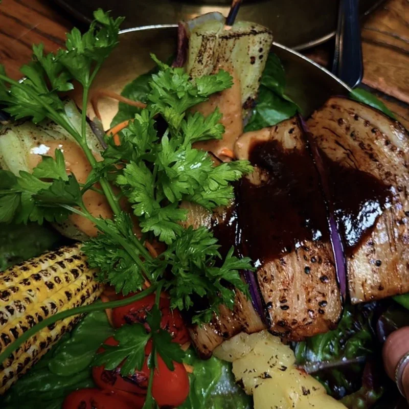 Grilled vegetable platter with savory sauce