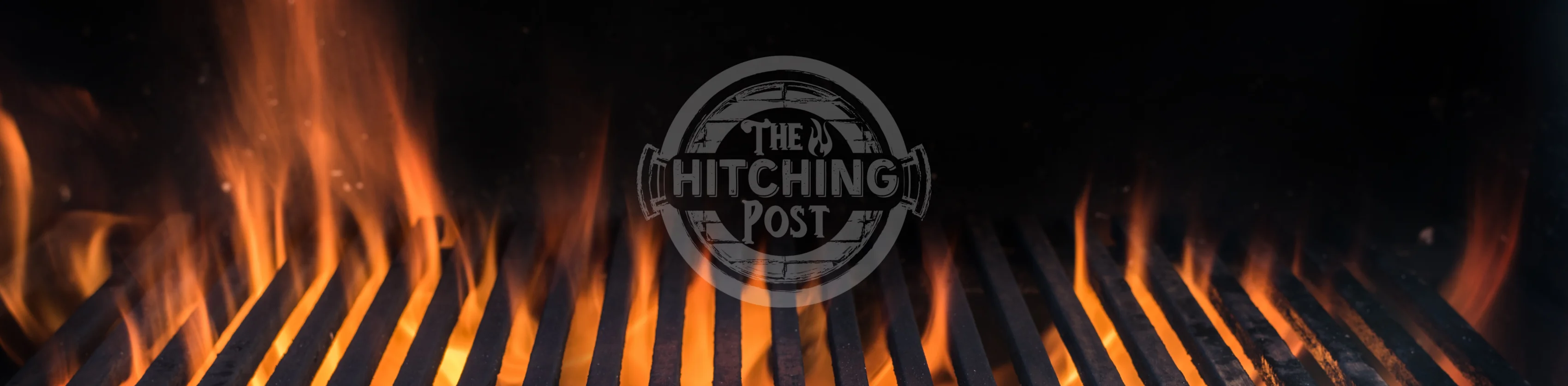 Grill flames at The Hitching Post restaurant