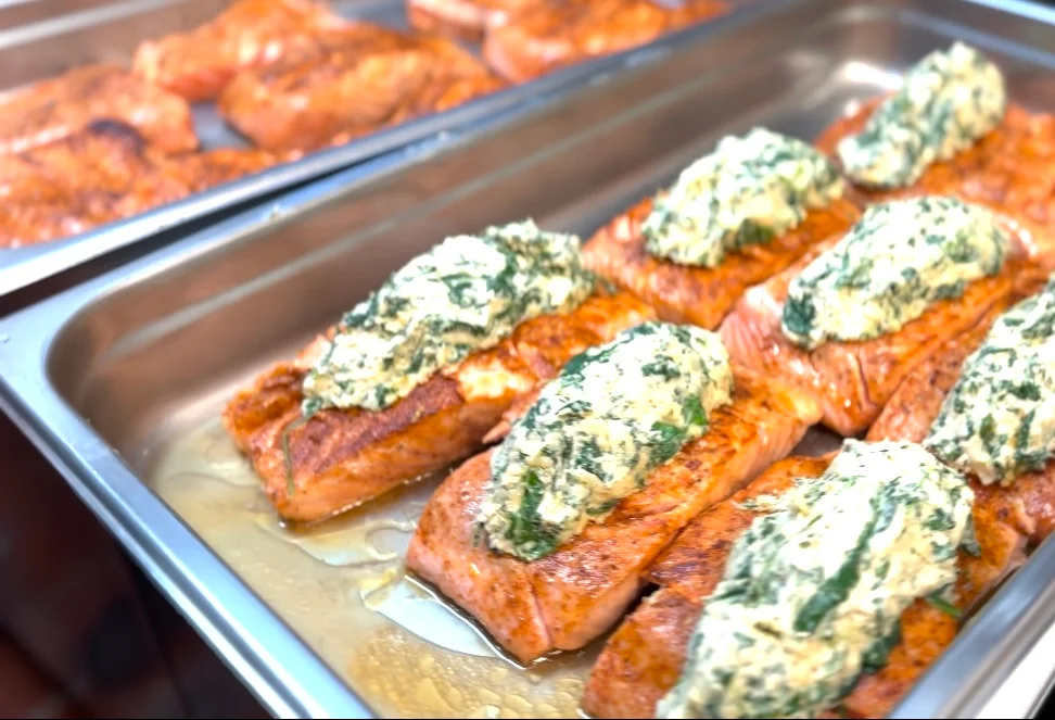 Baked salmon with creamy spinach topping