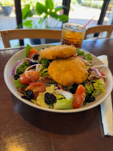 Crispy fried green tomato salad with mixed greens