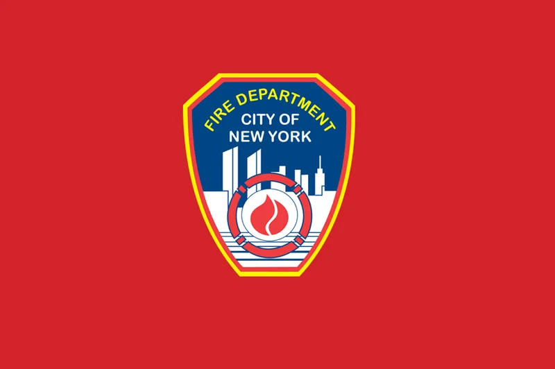 FDNY shield emblem displayed on a wall.