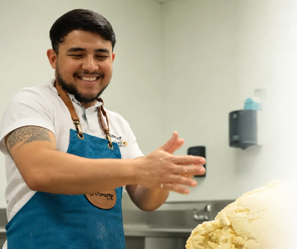 A restaurant chef preparing a dish