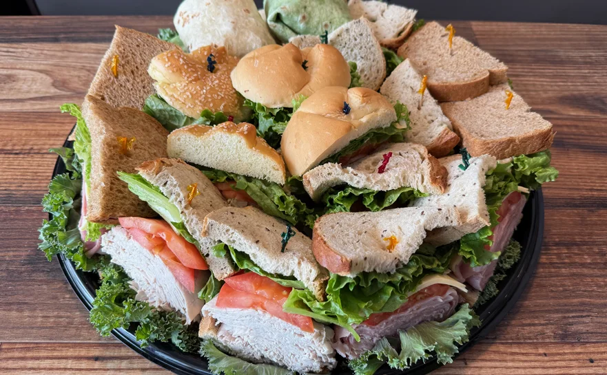Catering platter with assorted deli sandwich wedges