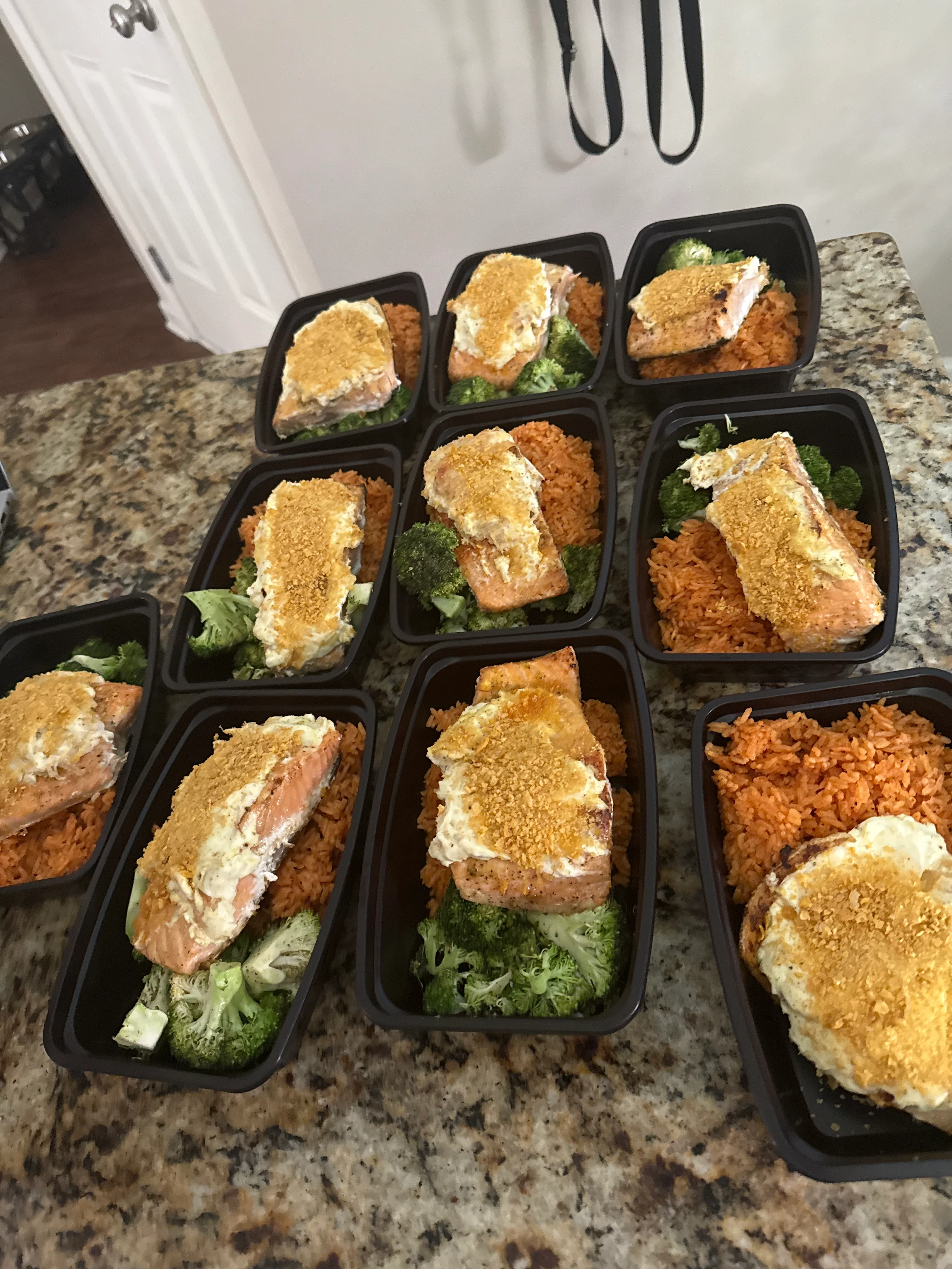Baked salmon with rice and broccoli meal prep containers