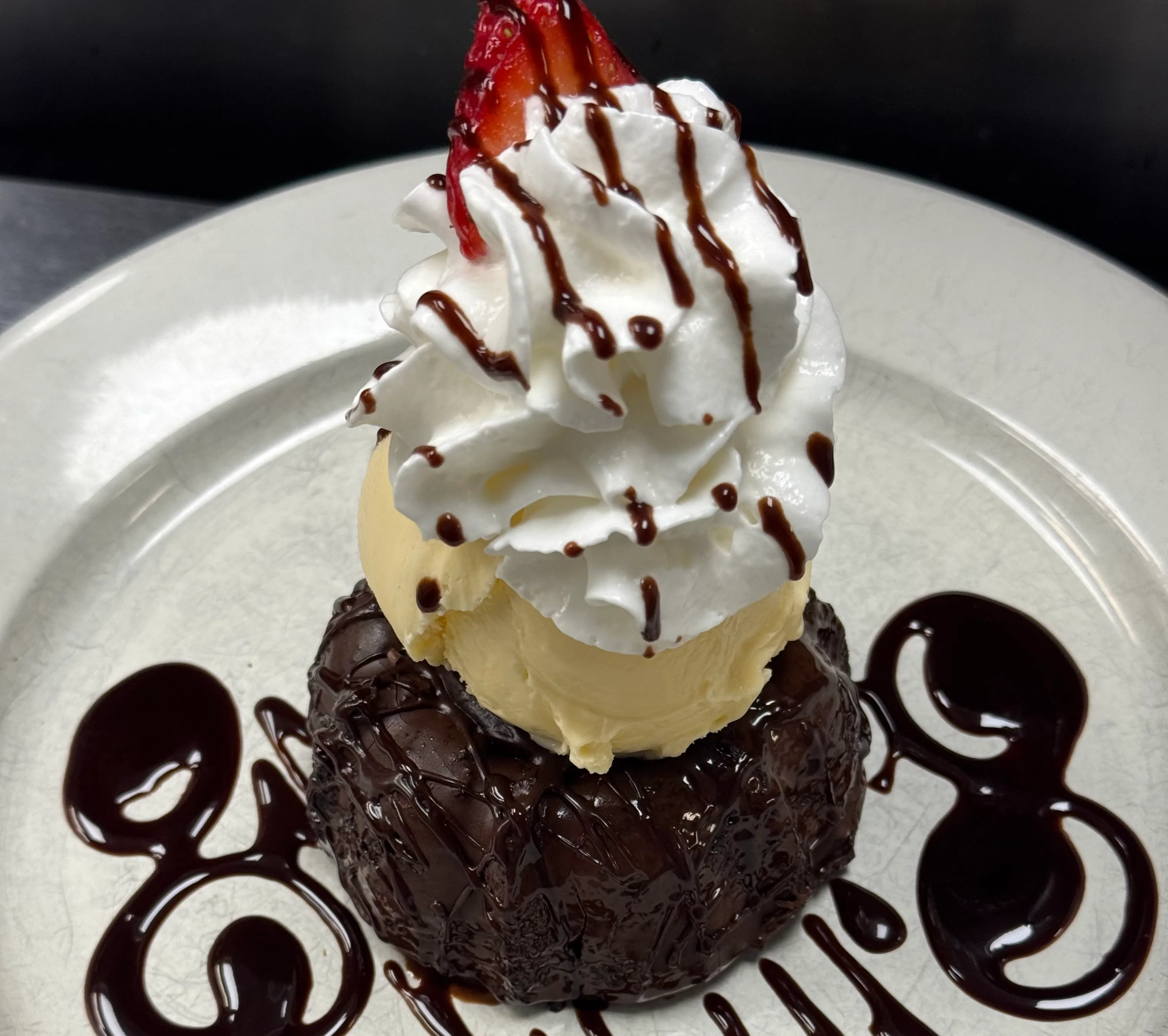 Decadent chocolate lava cake with vanilla ice cream