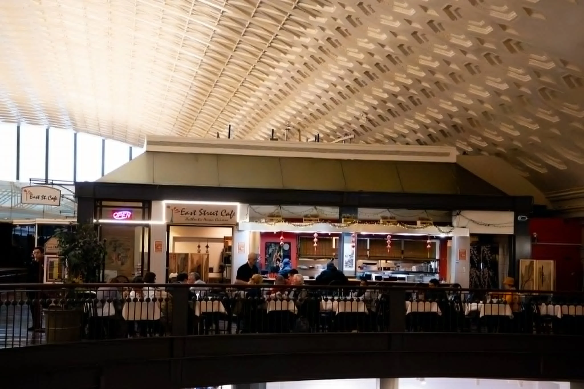 Cozy restaurant interior with modern decor and open kitchen