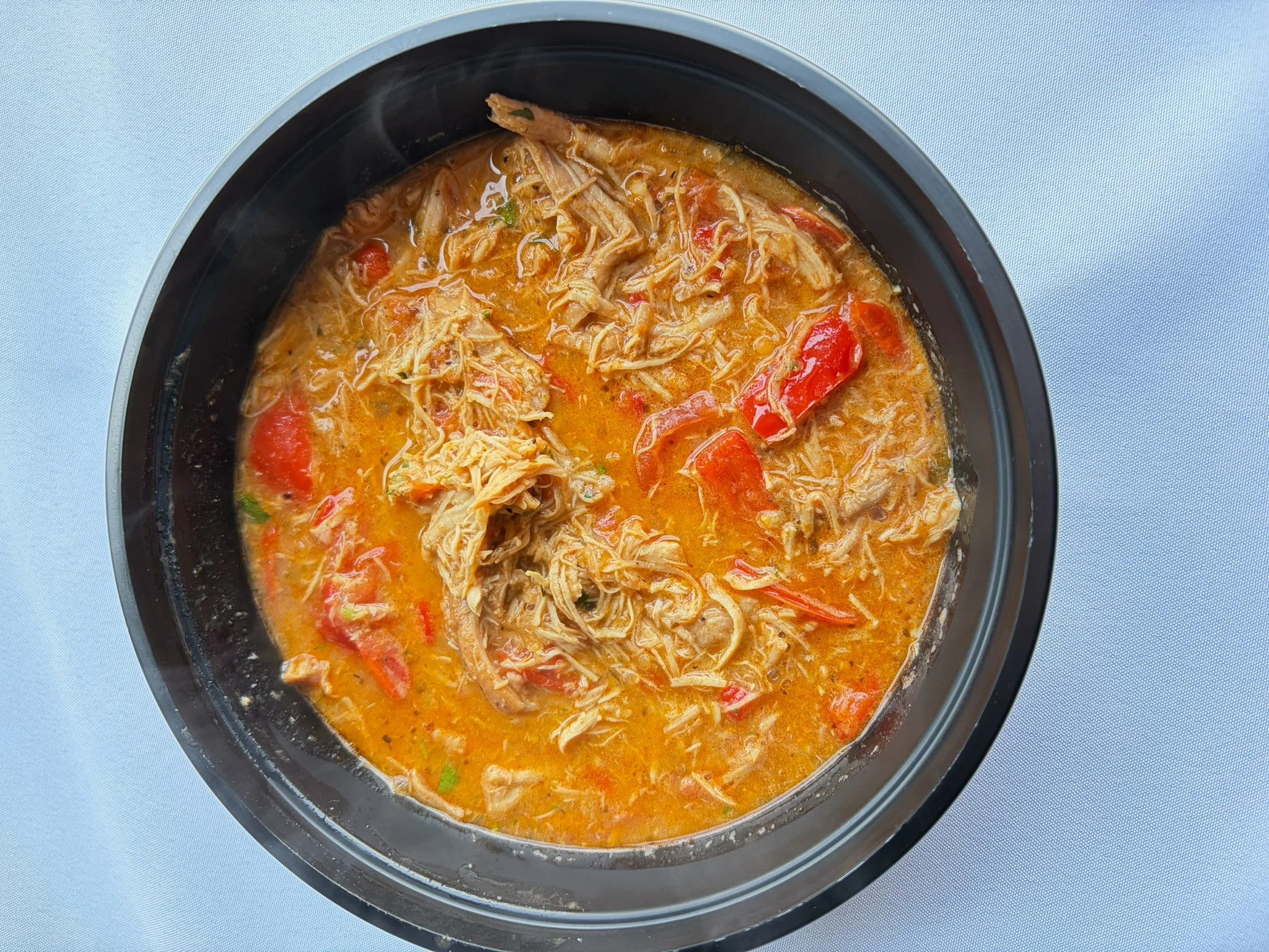 Savory Colombian chicken sancocho in a bowl