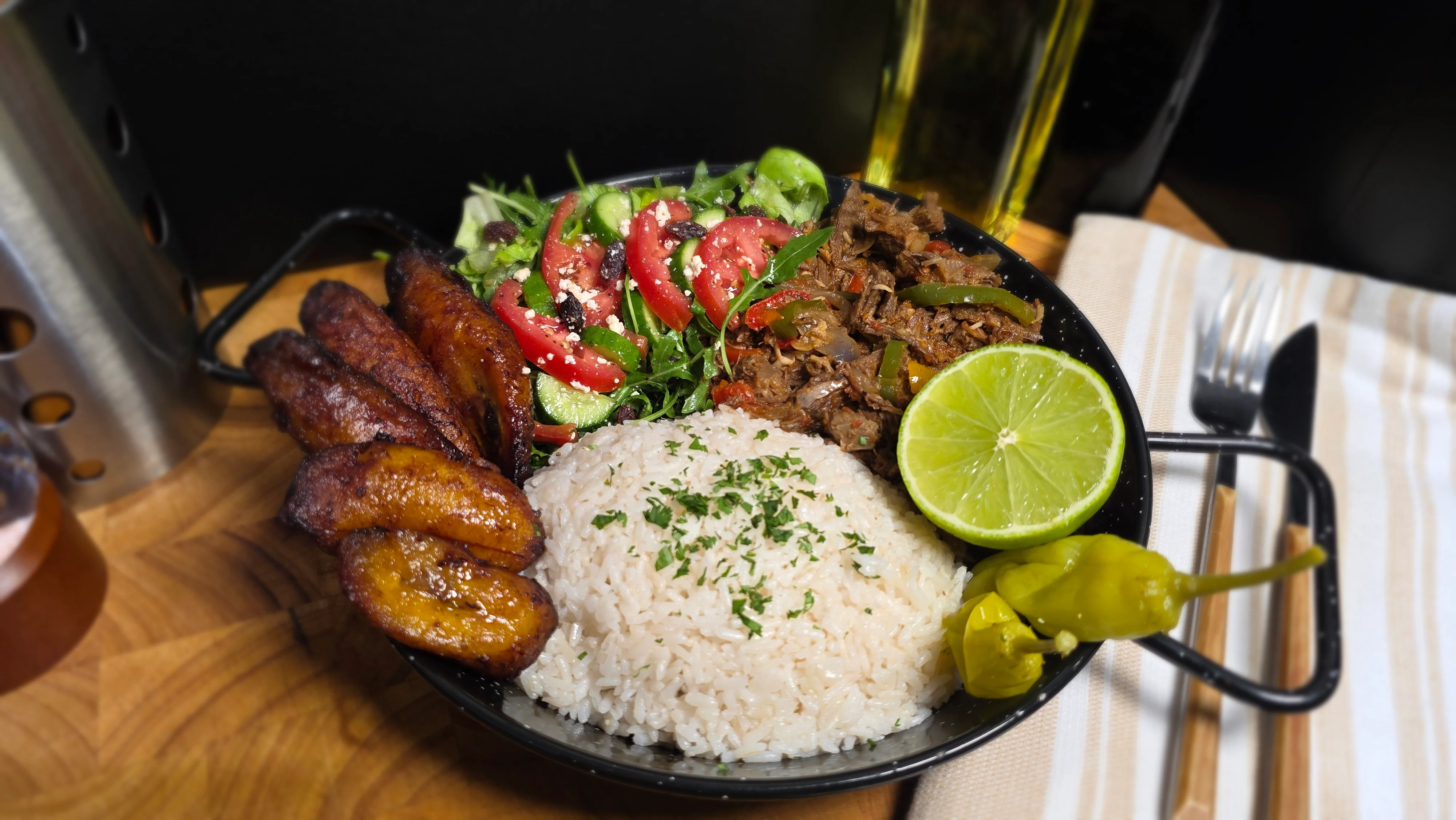Cuban ropa vieja with rice and plantains