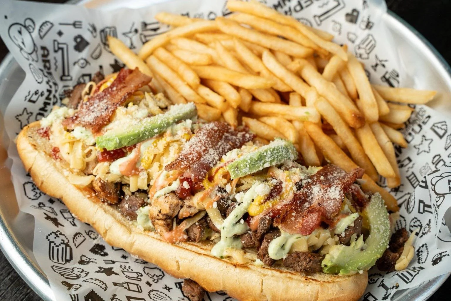 Loaded Mexican torta with fries on the side