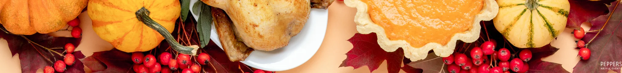 Thanksgiving feast with roasted turkey, pumpkin pie, and autumn decorations
