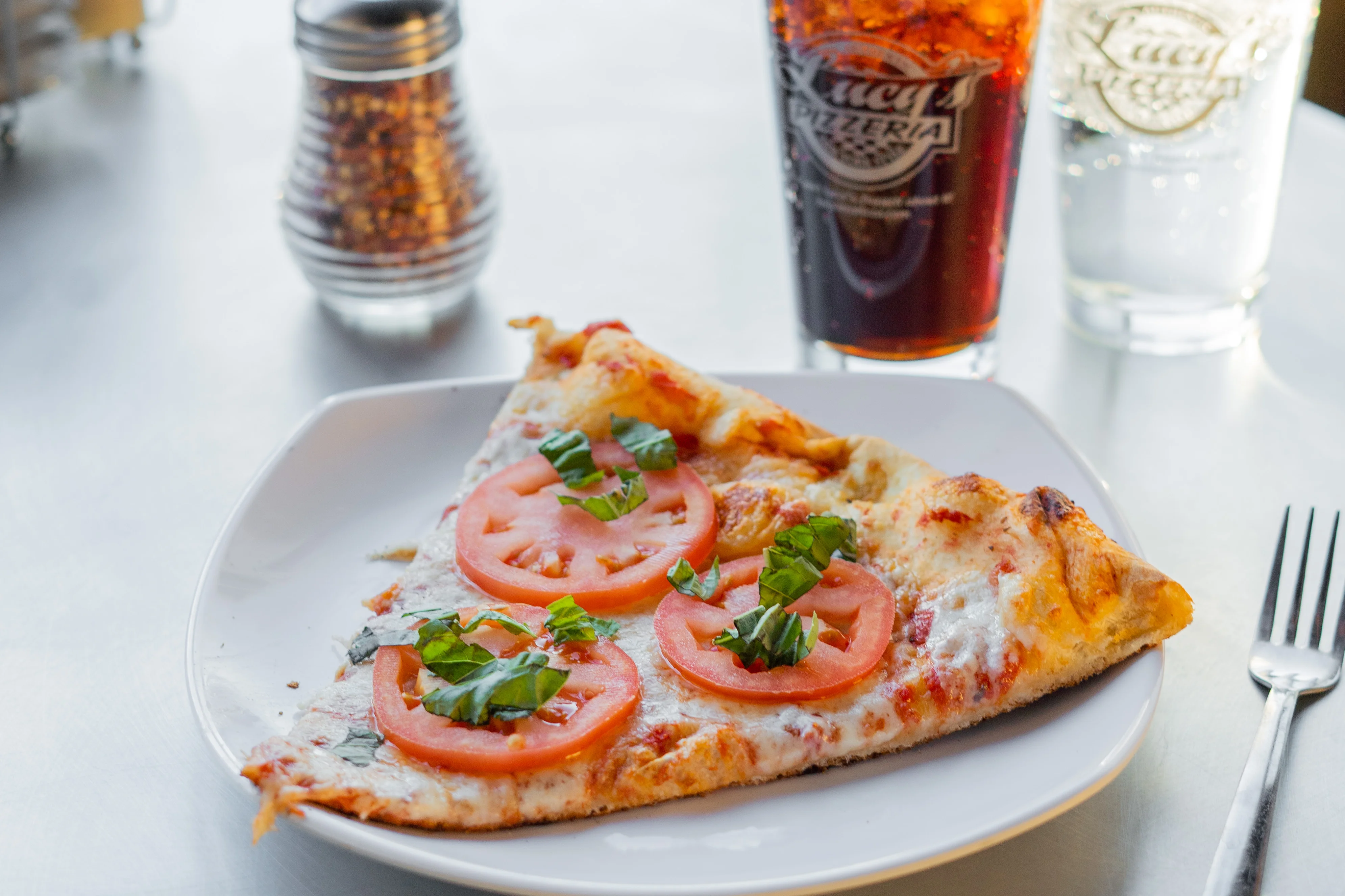 Margherita slice and drink