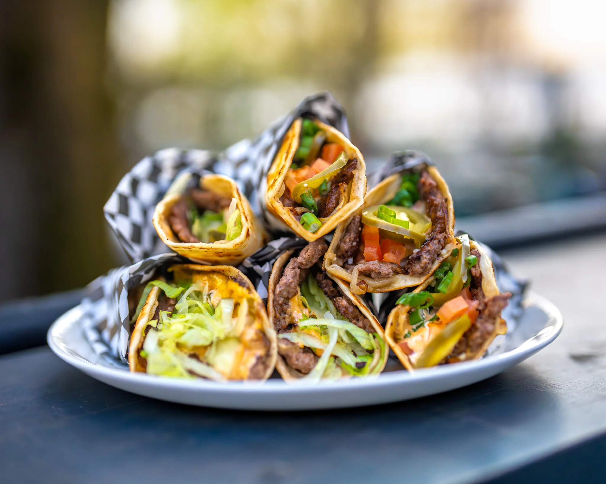 Delicious Mexican tacos filled with beef and fresh toppings