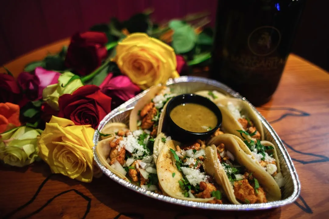 Delicious Mexican street tacos served with salsa
