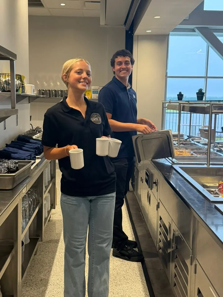 Staff serving coffee in a modern restaurant setting