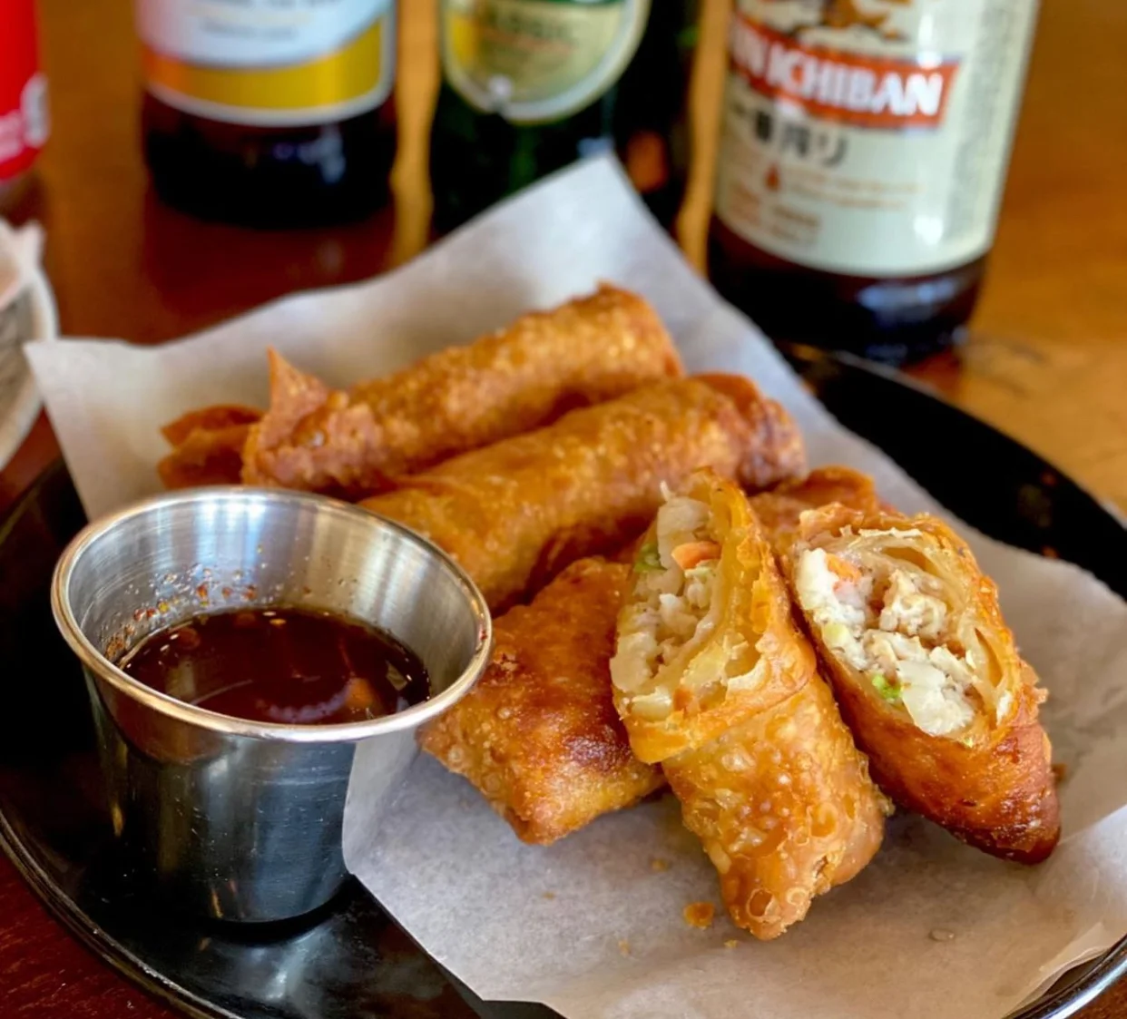 Crispy spring rolls served with dipping sauce