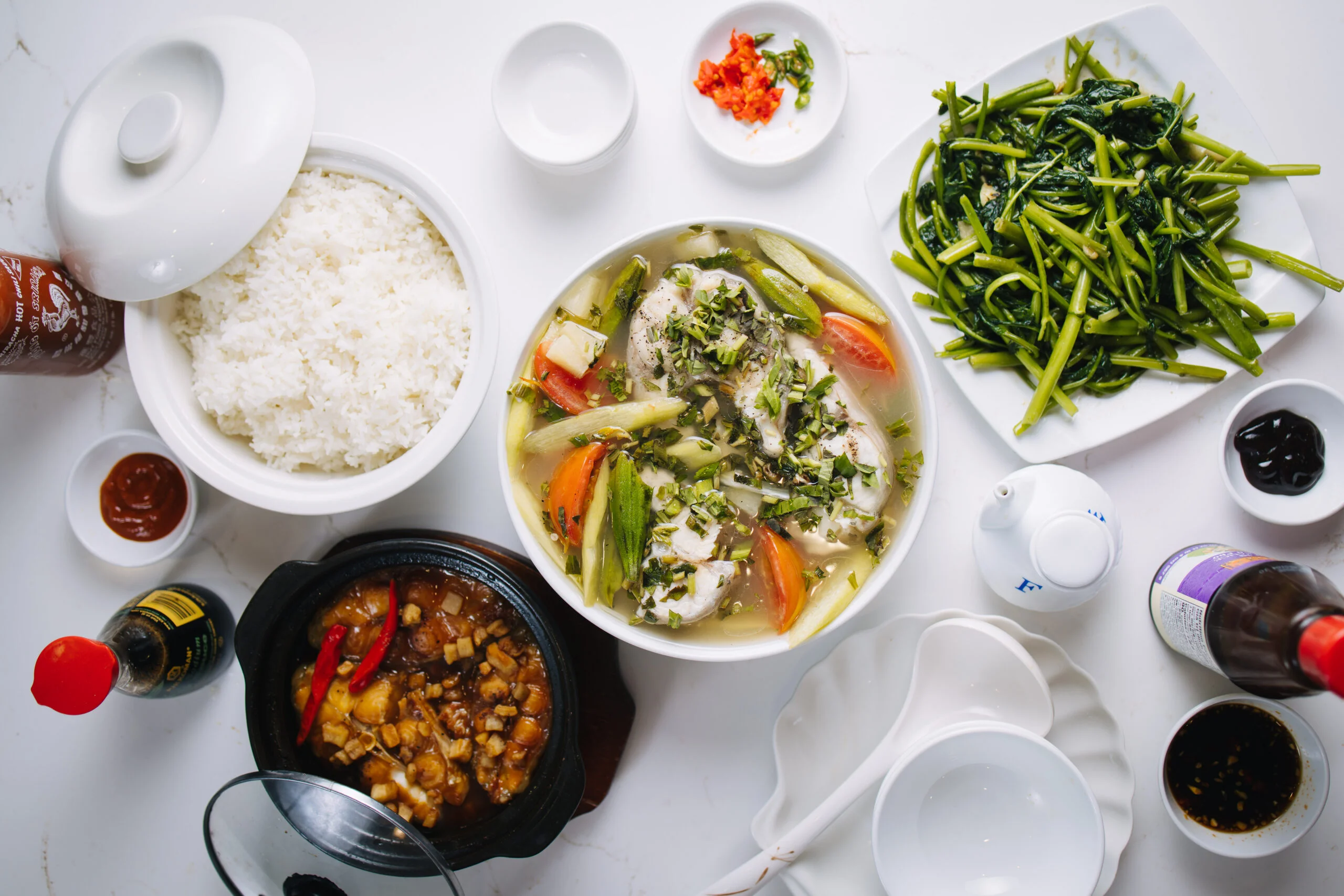 A beautifully arranged table with delicious dishes and drinks.