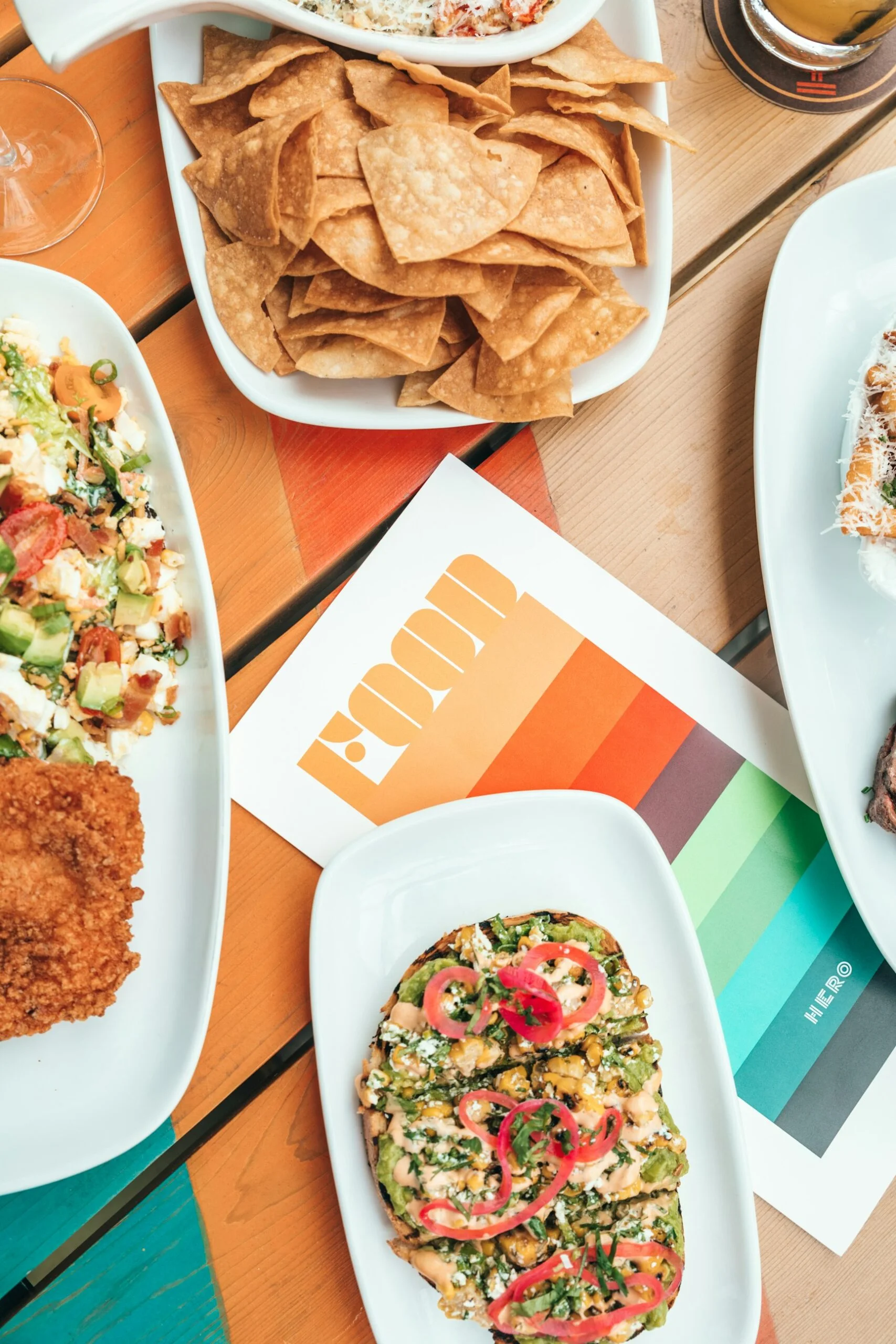 Colorful Mexican dishes with tortilla chips and vibrant toppings