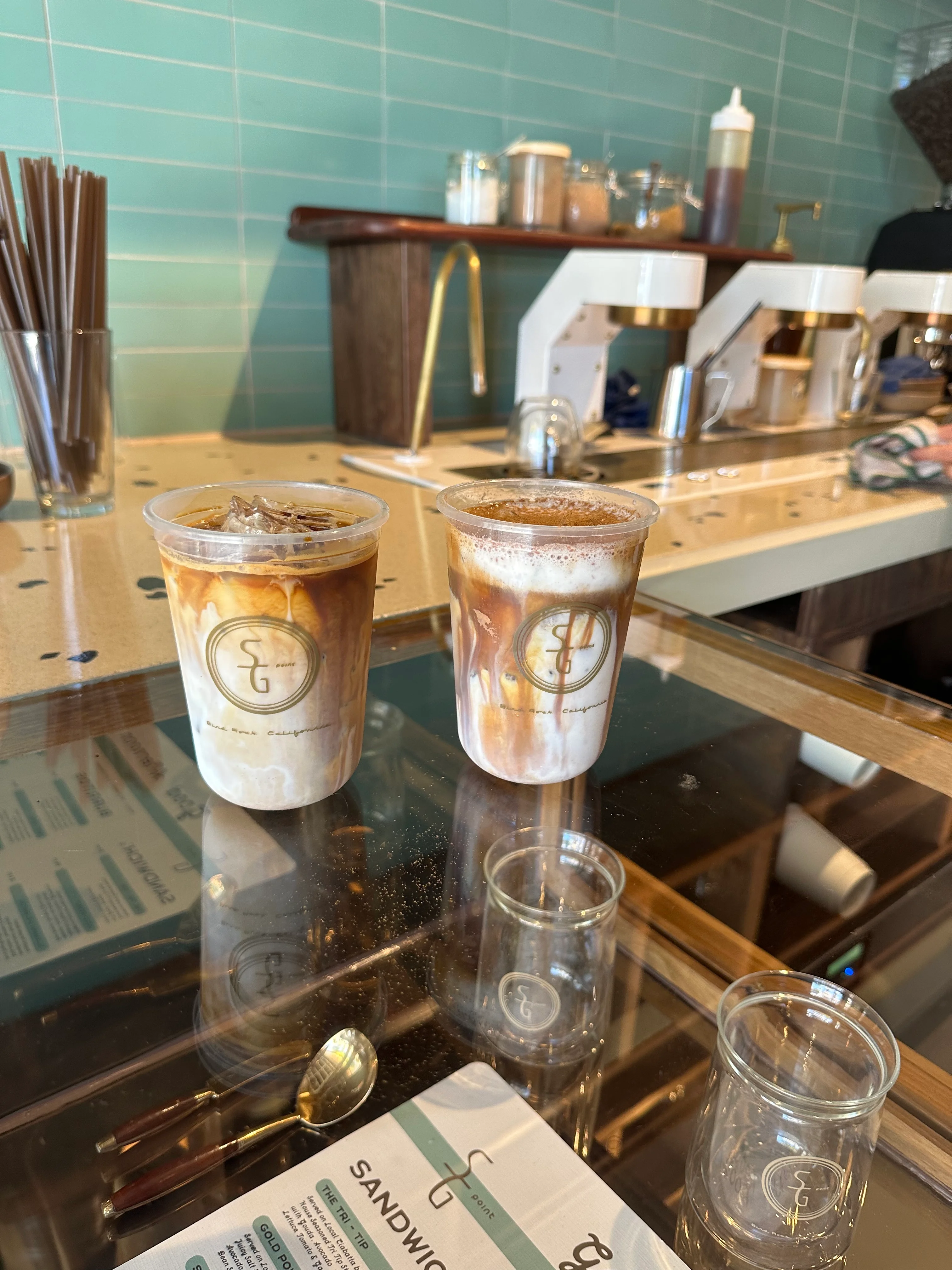 Iced coffee drinks with layered milk and espresso