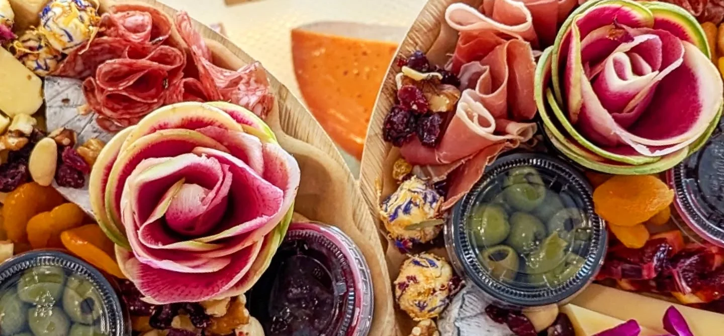 Artisan charcuterie board with assorted cheeses and fruits