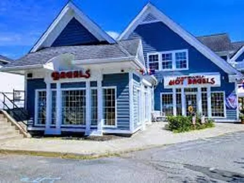 Charming bagel shop exterior with blue siding