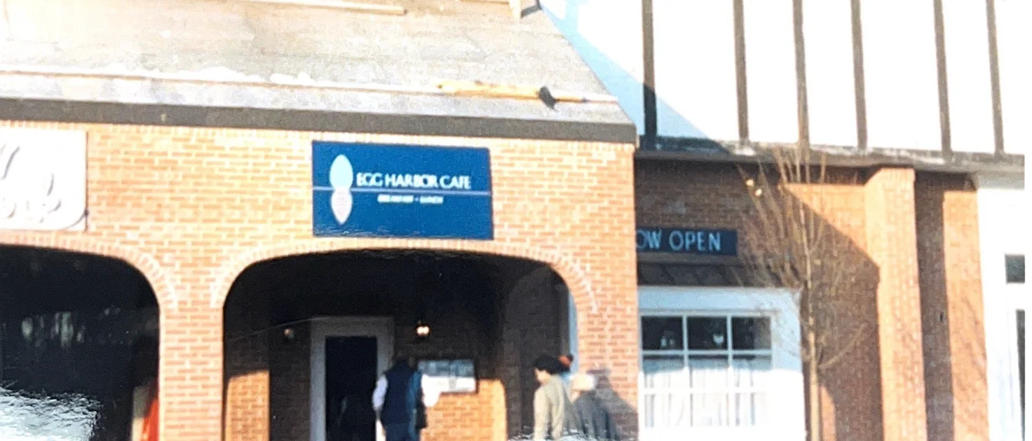 Exterior view of EGC Harbor Cafe with open sign