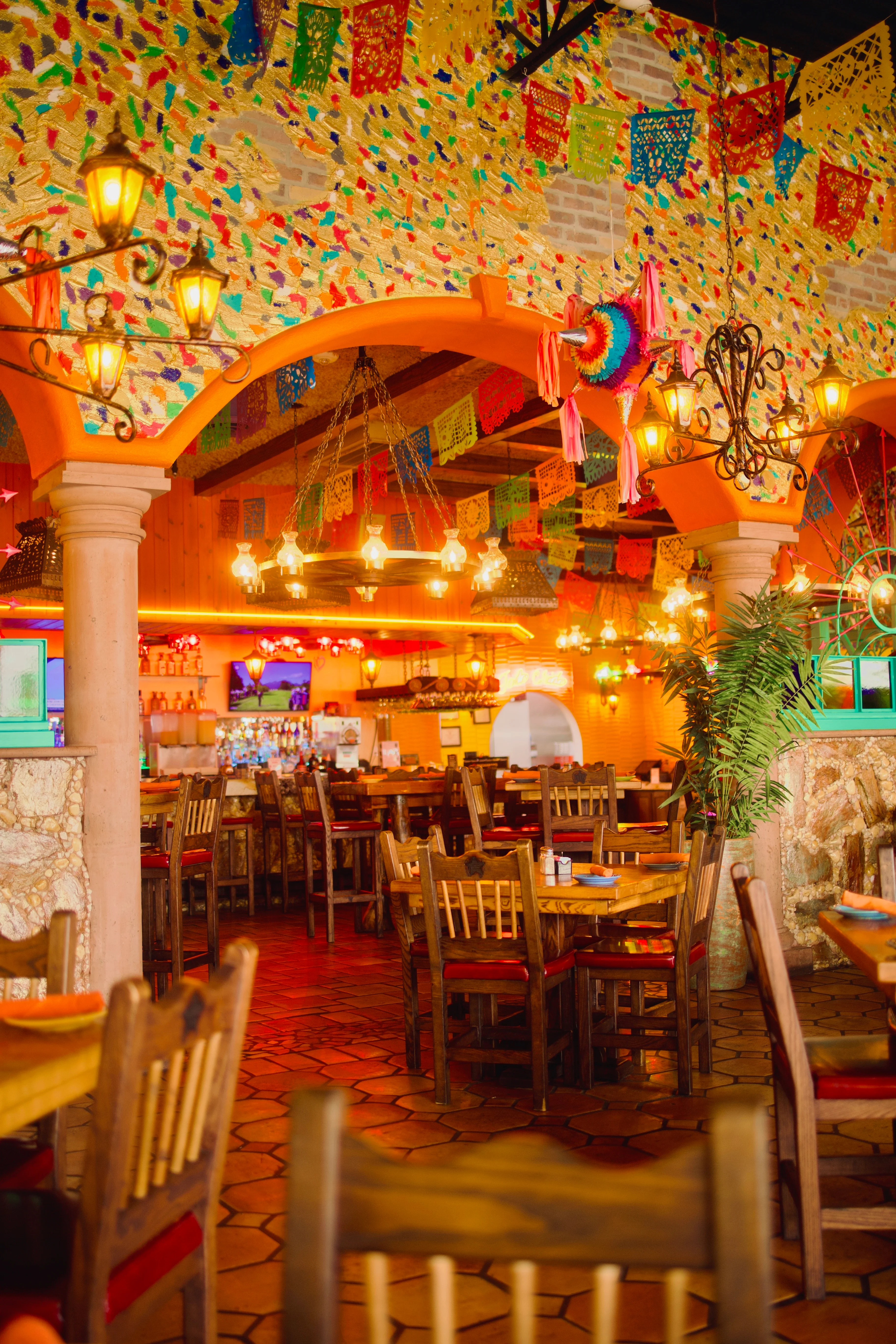 Vibrant restaurant interior with colorful decor and warm lighting