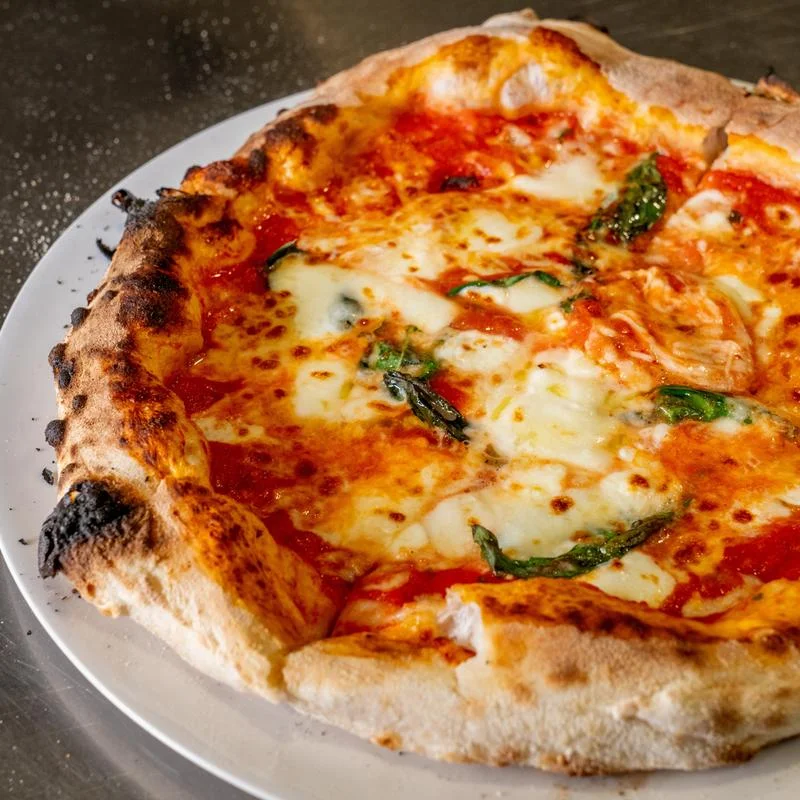 Margherita pizza fresh from a wood-fired oven