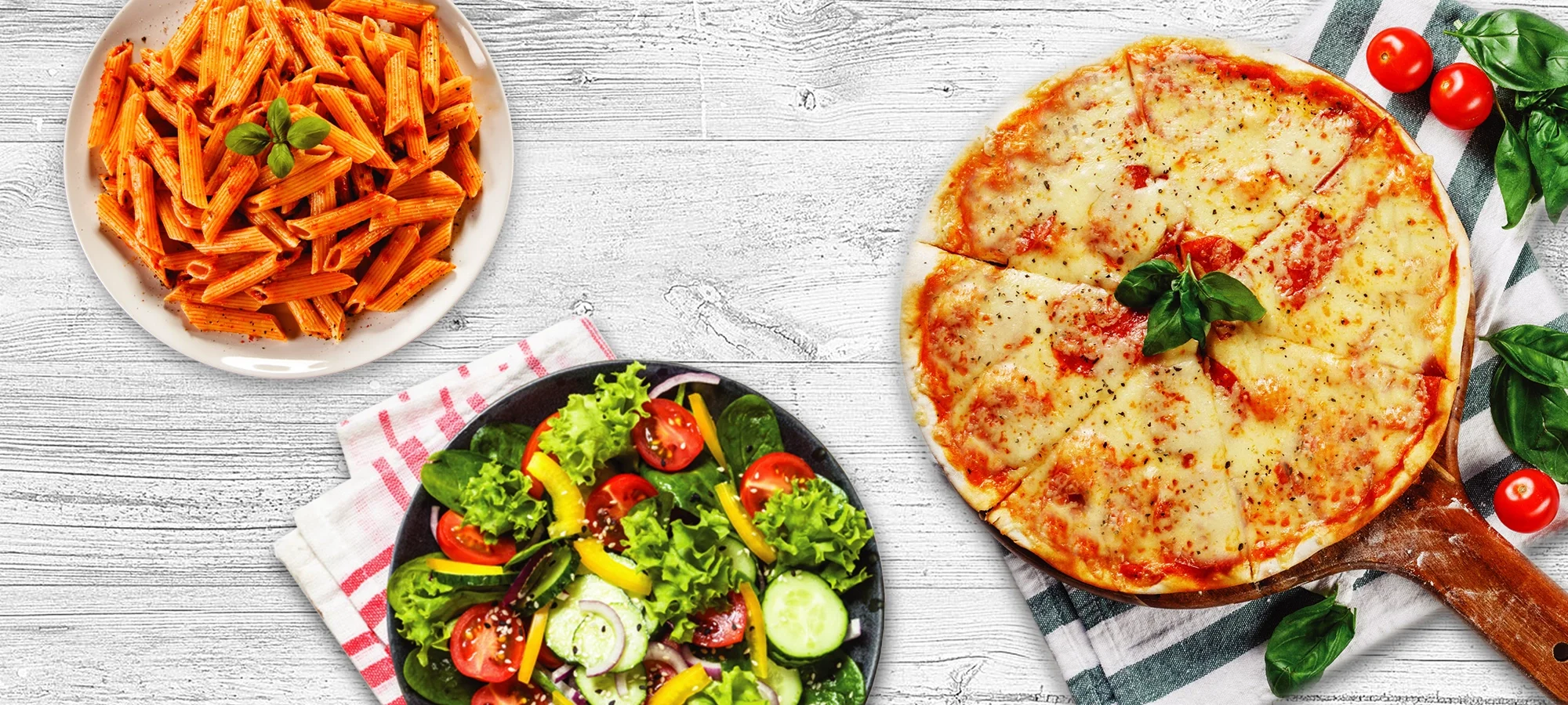 Italian pasta with marinara sauce, fresh salad, and Margherita pizza