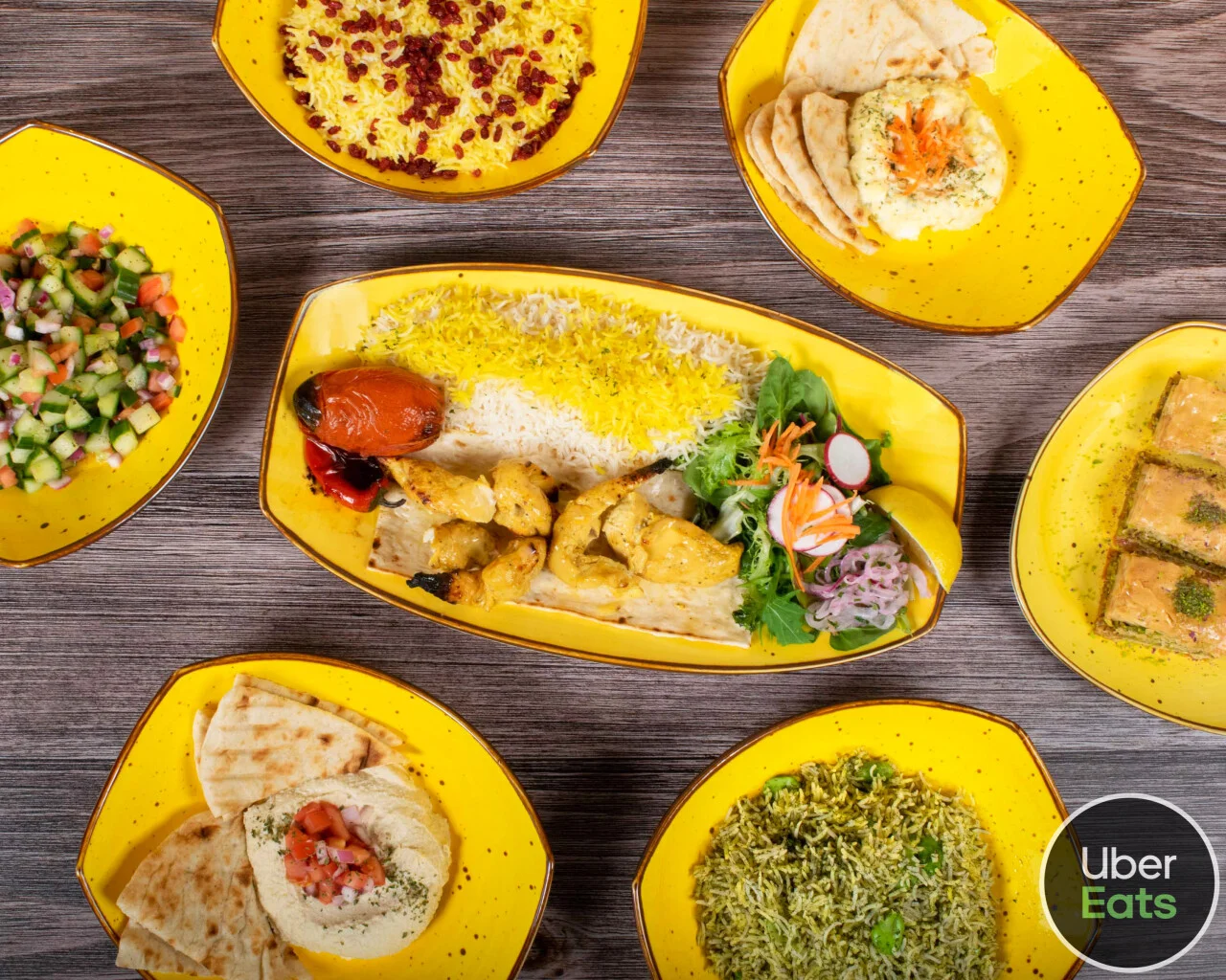 Persian kebab platter with saffron rice and fresh salad