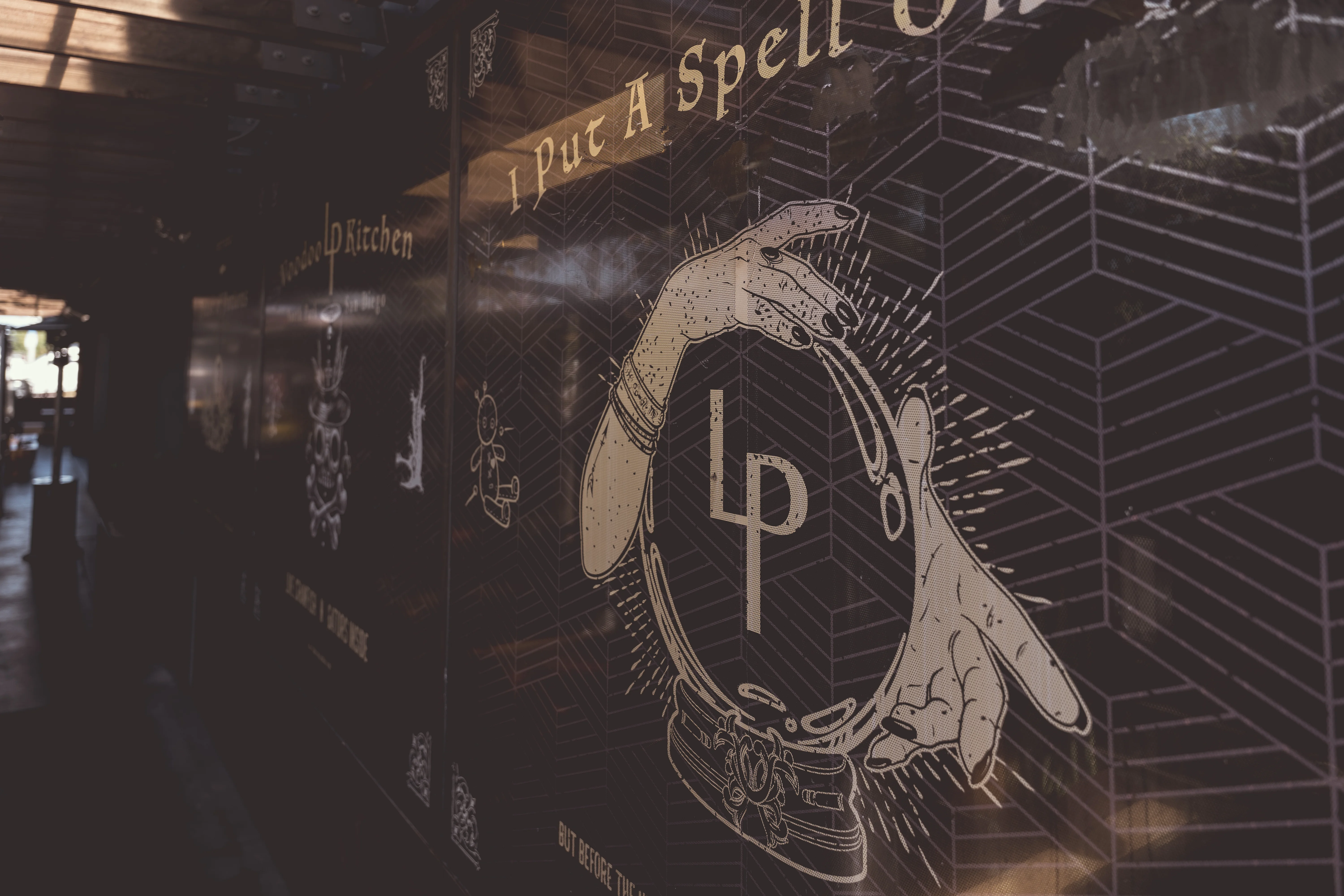 Artistic restaurant wall design with mystical elements