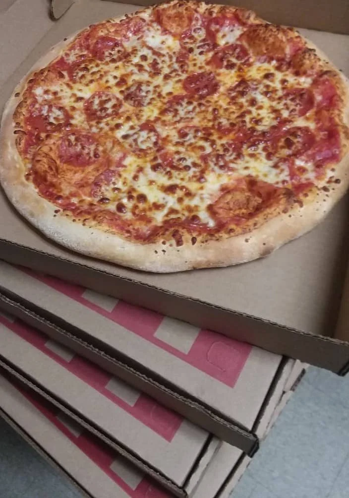 Pepperoni pizza in a pizza box