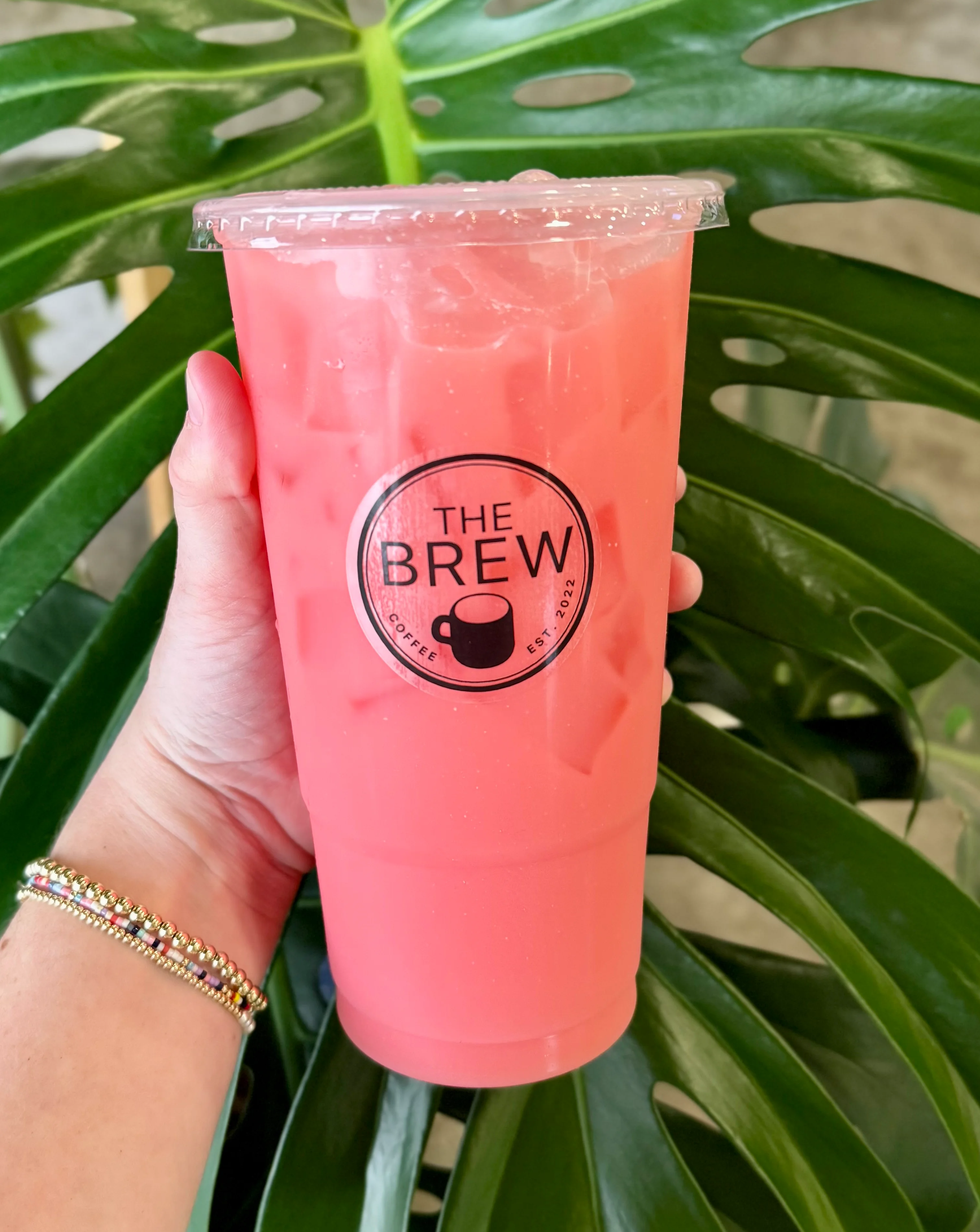 Refreshing pink iced beverage from The Brew coffee shop