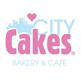 City Cakes Bakery & Cafe logo with urban skyline and heart design