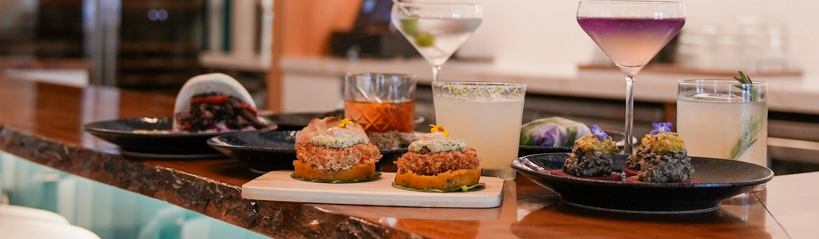 Artistic presentation of modern Latin cuisine with cocktails