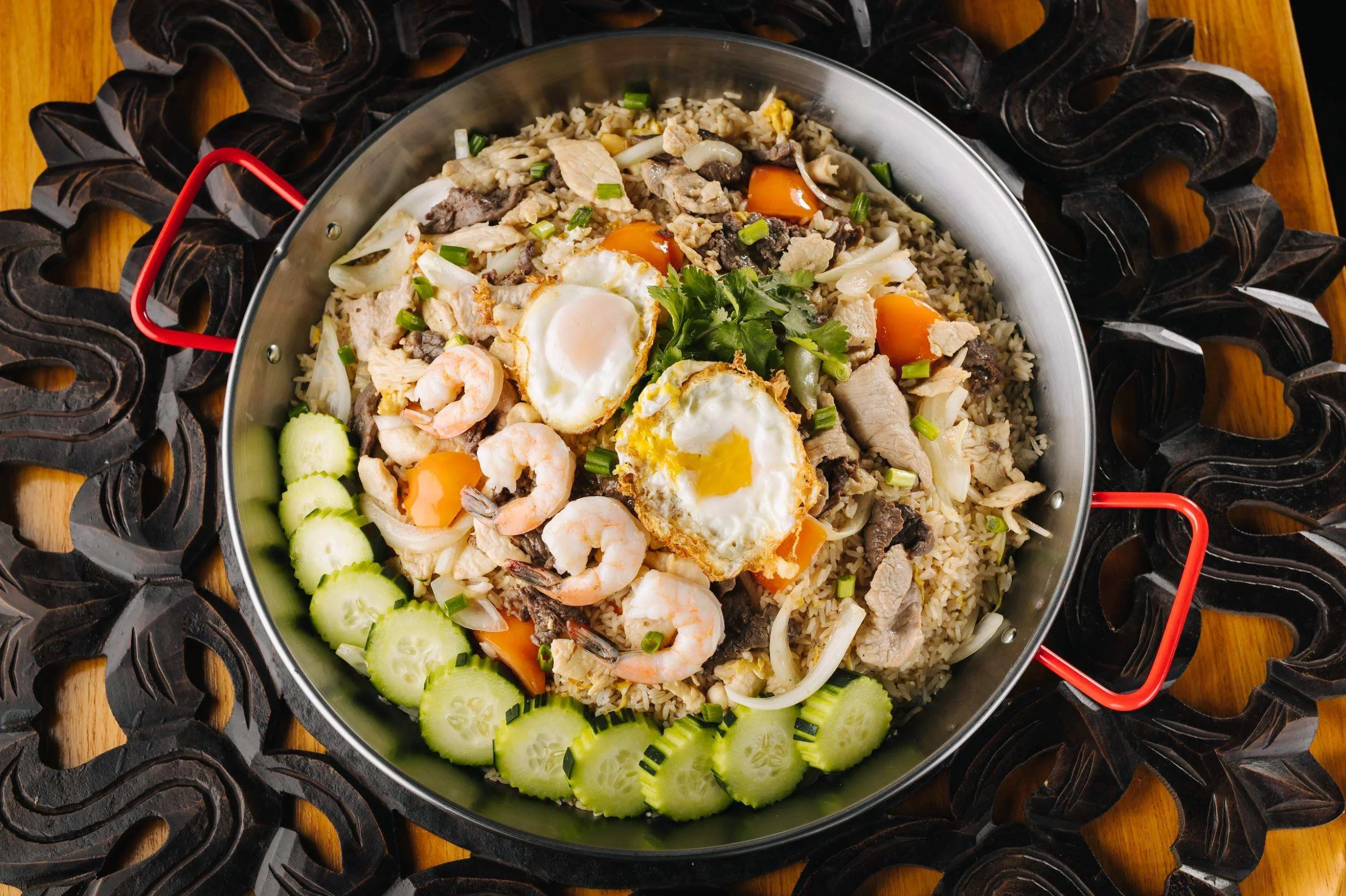 Delicious Malaysian Nasi Goreng with shrimp and fried eggs
