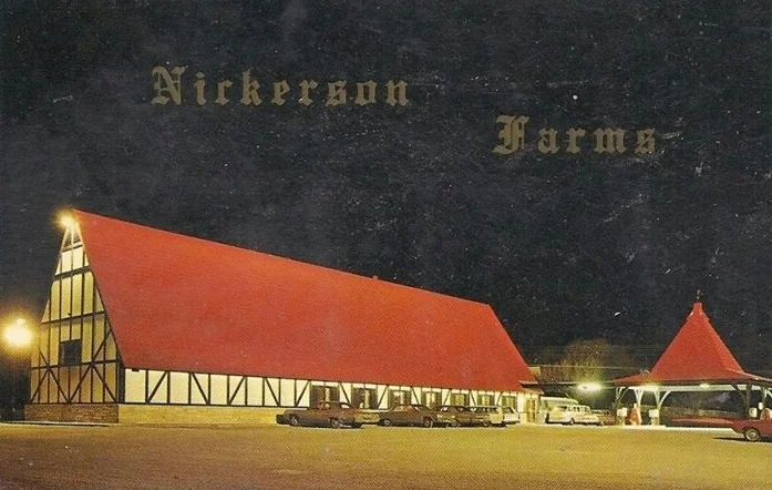 Night view of Nickerson Farms restaurant with distinctive architecture