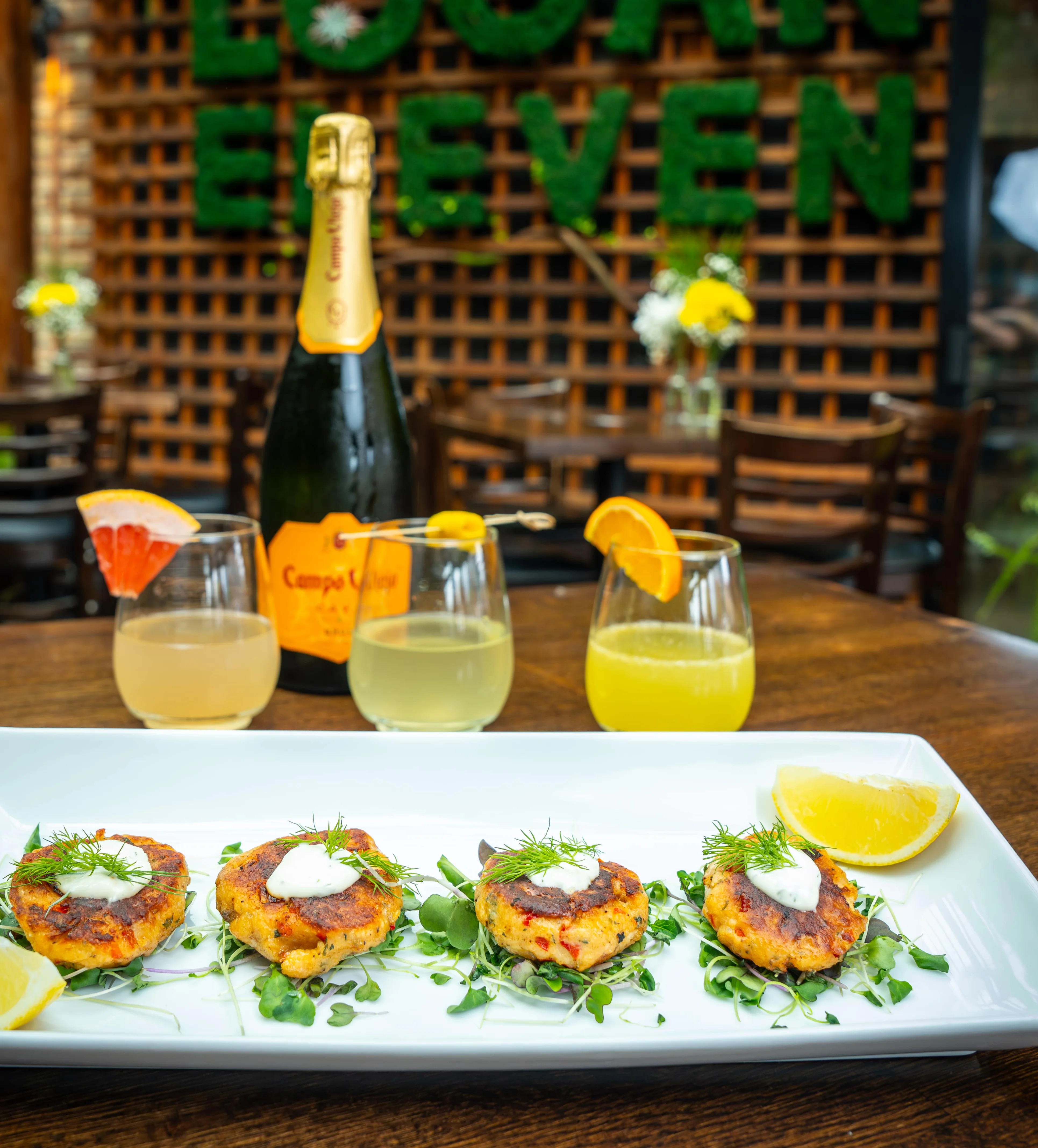 A display of mimosas and salmon cakes at Logan 11