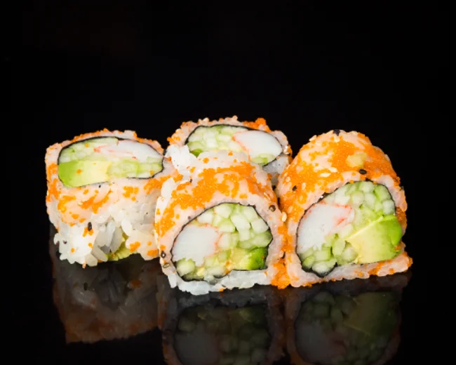 Japanese sushi rolls with shrimp and spicy sauce