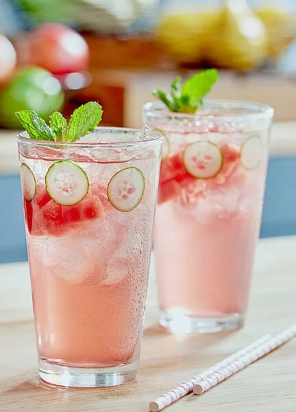 Refreshing cucumber mint mocktail in tall glasses