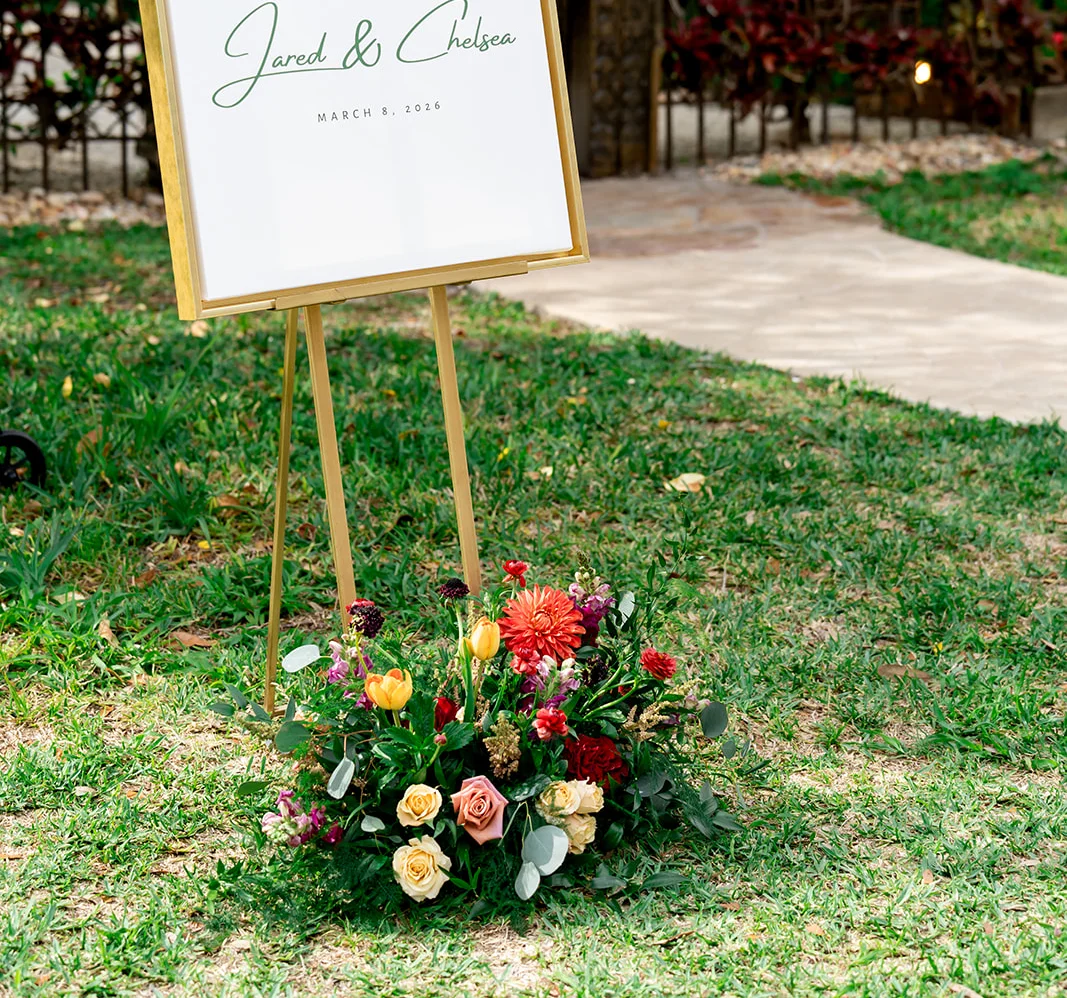 Welcome sign for a wedding with floral decor