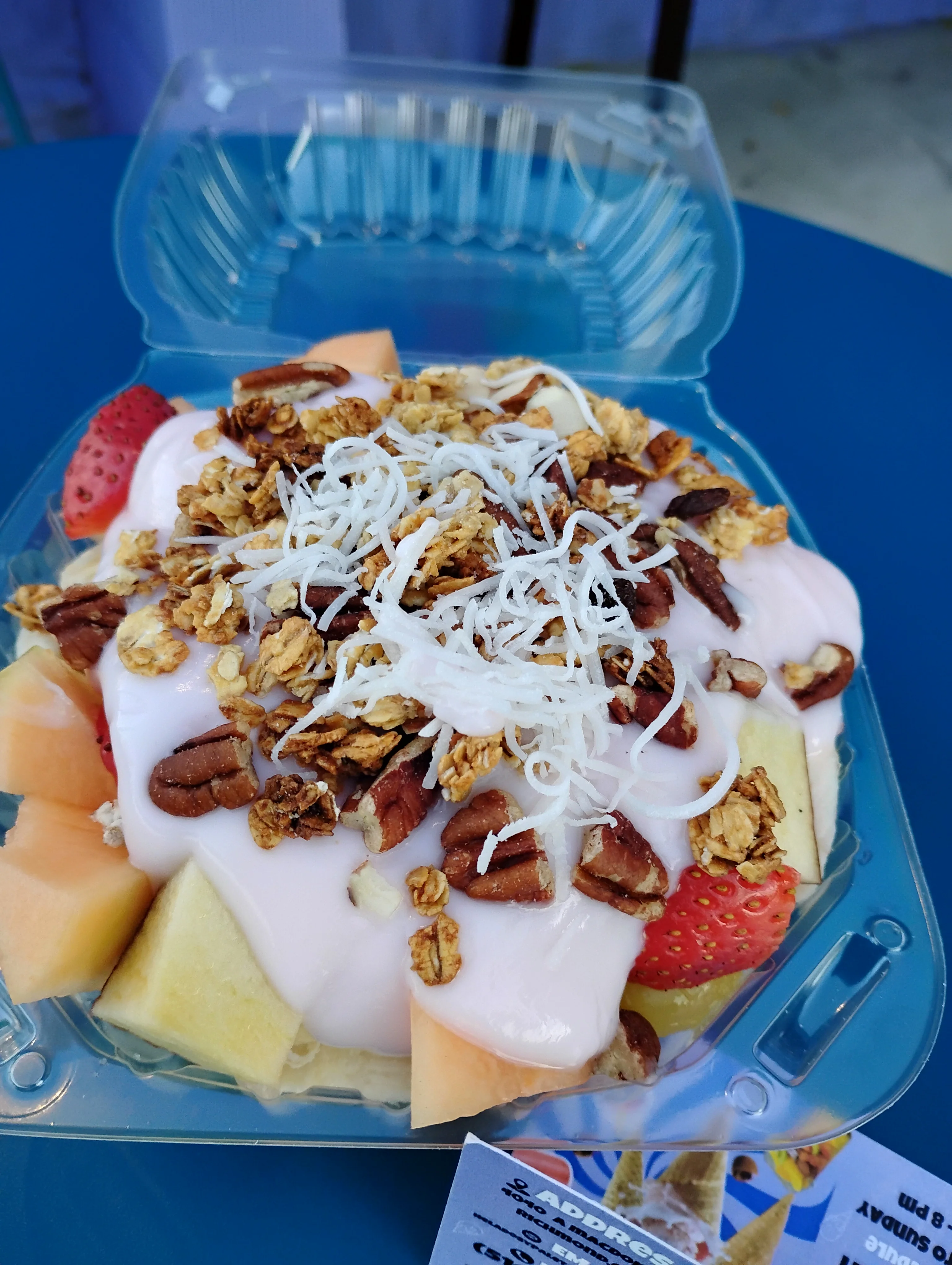 Colorful fruit parfait with yogurt and granola
