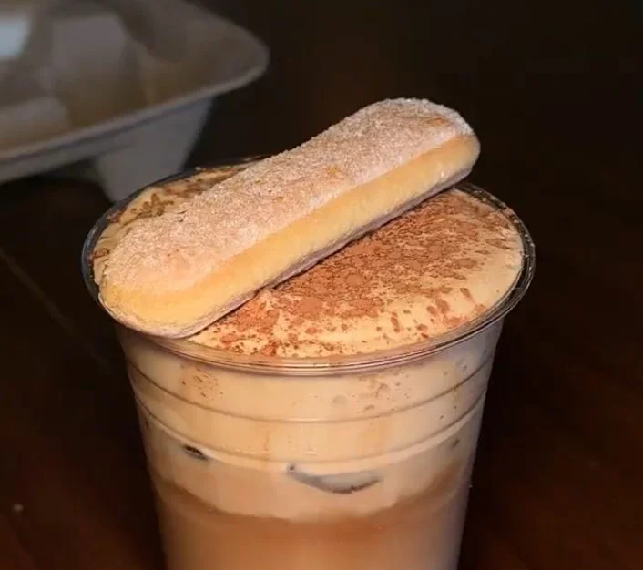 Iced coffee with a sweet biscuit topping