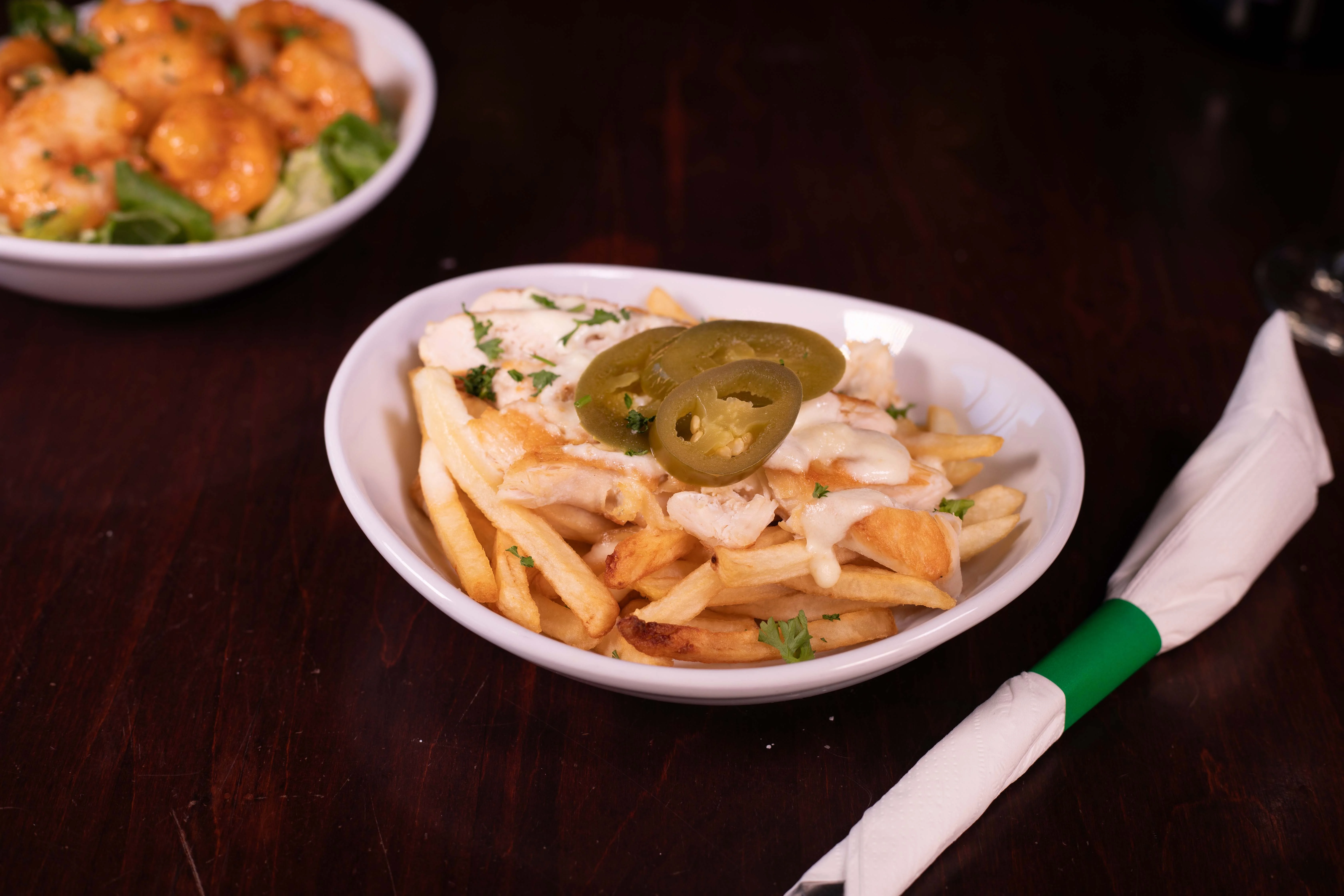 Loaded fries with chicken and jalapeños