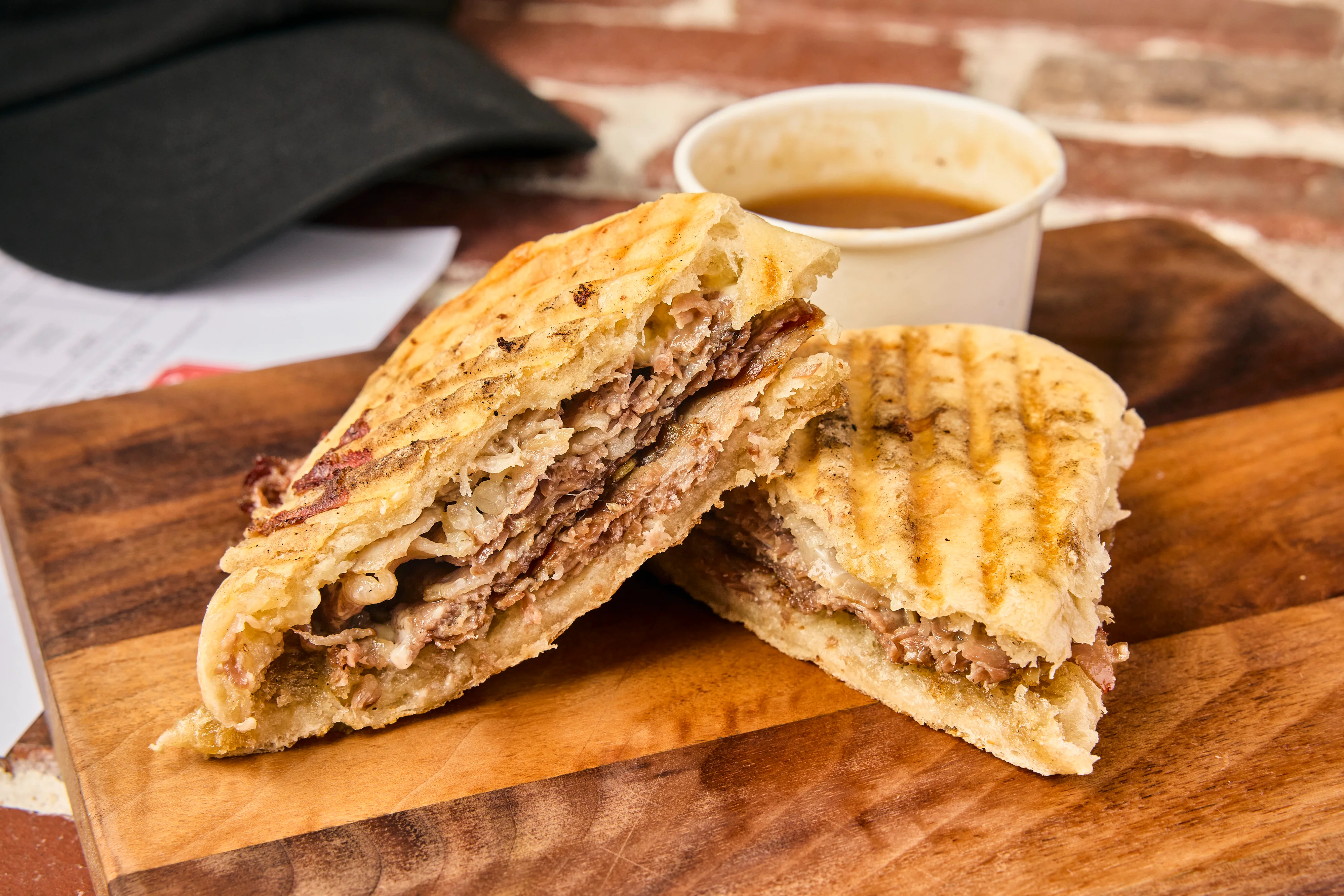 The Dip has beef brisket brined for 72 hours and then slowly roasted for 15 hours. Thinly sliced with mayonnaise and side of house au jus on our grilled ciabatta bread.