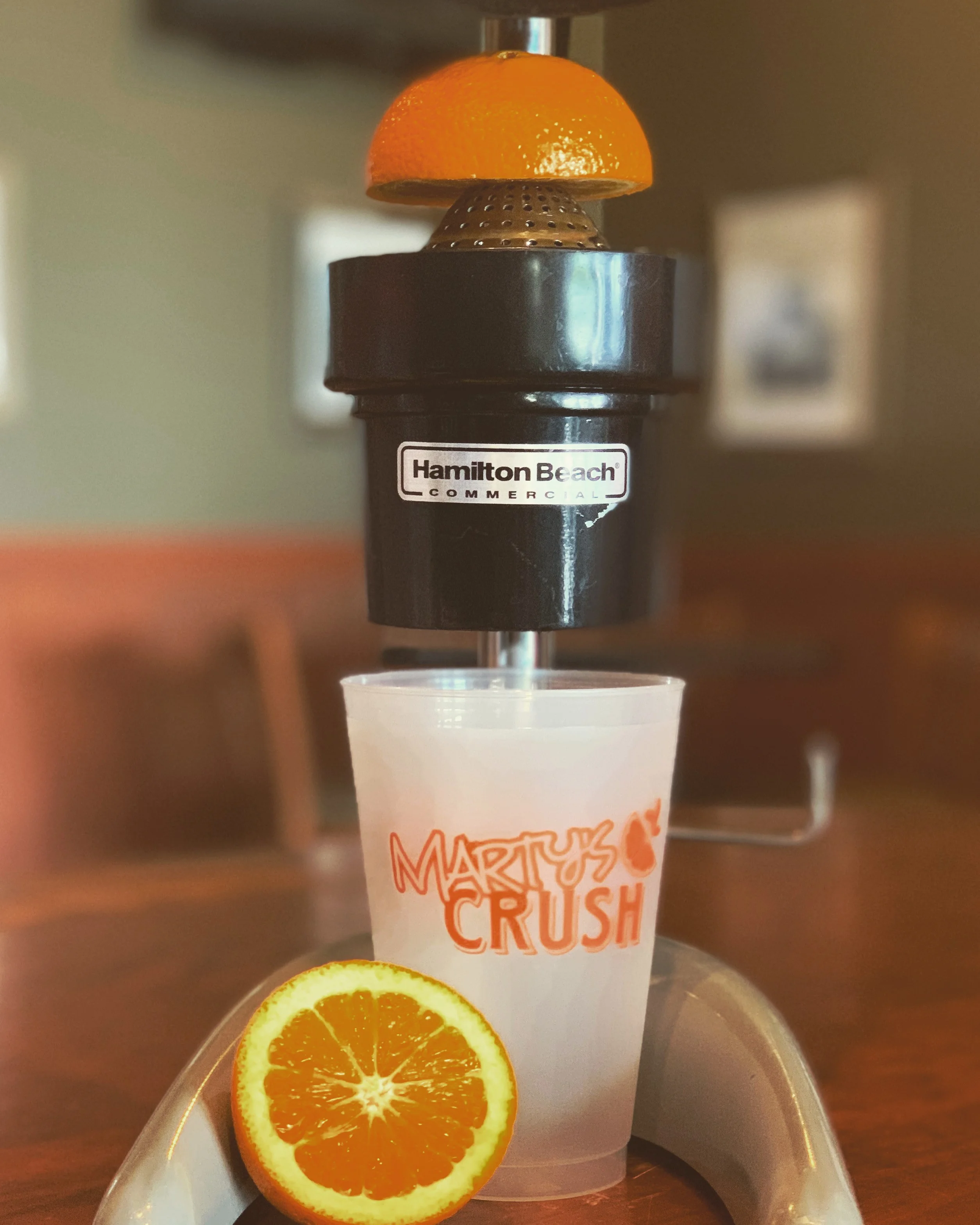 Freshly squeezed orange juice being prepared