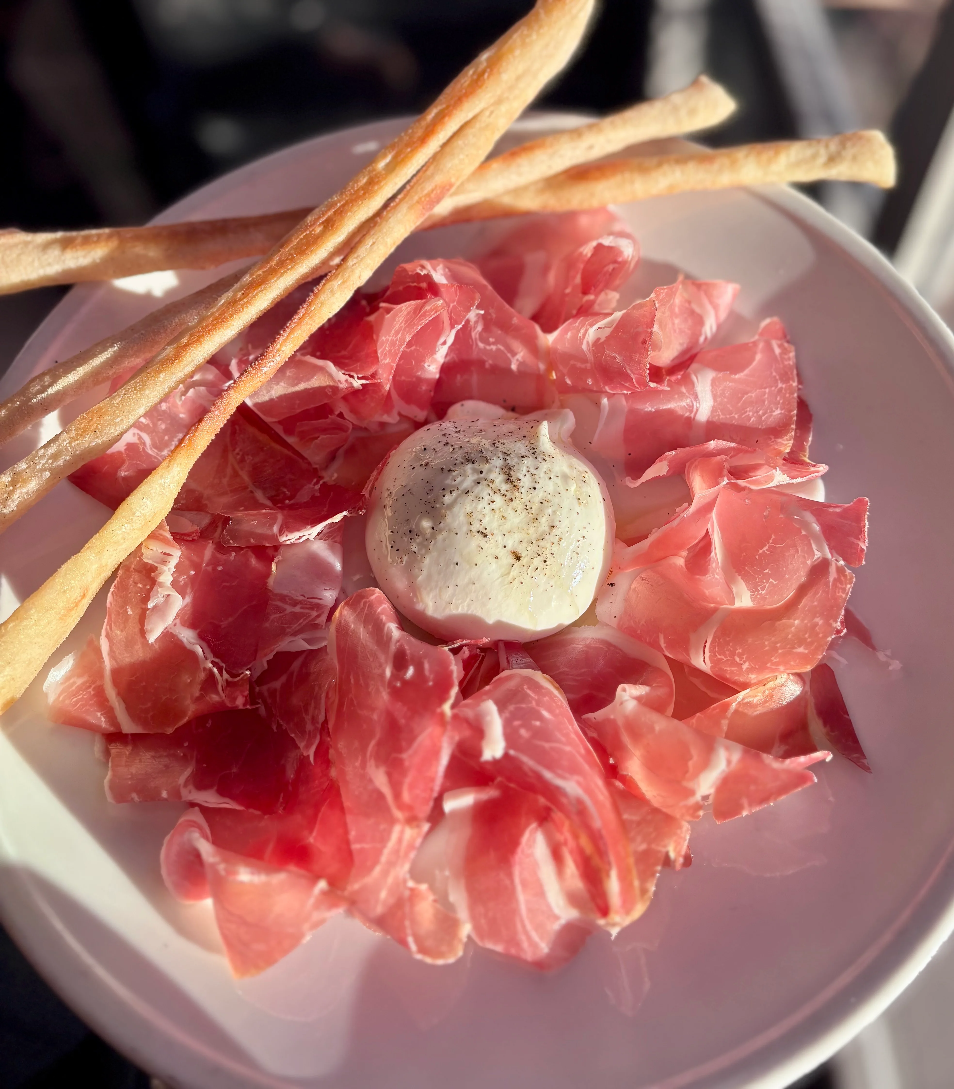 Italian prosciutto platter with burrata cheese