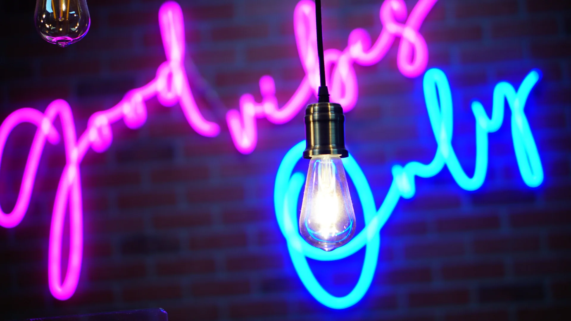 Cozy restaurant interior with neon lights and warm ambiance
