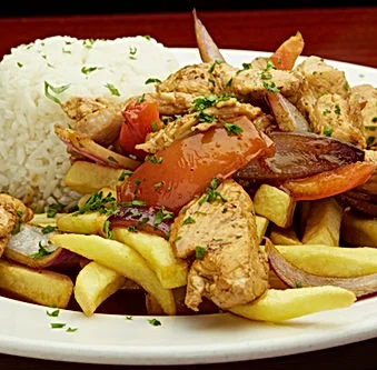 Peruvian pollo a la brasa with fries and rice