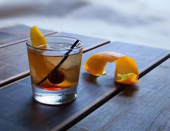 Classic Old Fashioned cocktail with orange peel garnish
